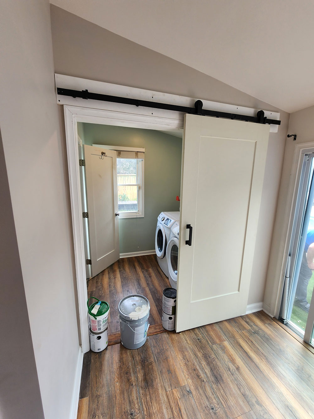 1/2 bath and laundry room view from main room