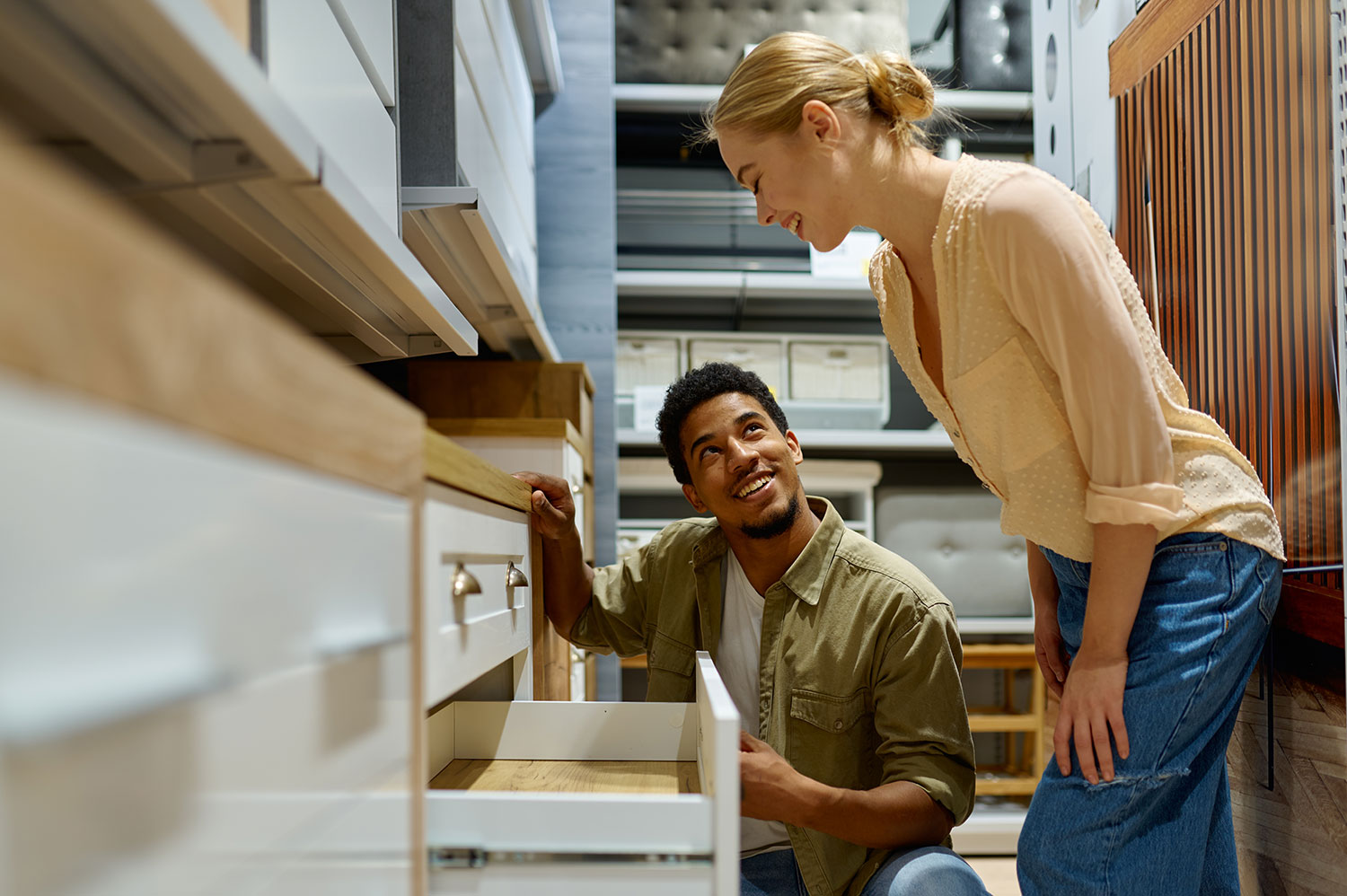 couple shopping for kitchen cabinets